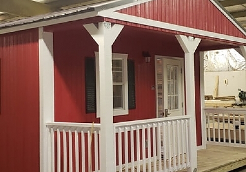  Red tiny house with white trim in Hugo, OK
