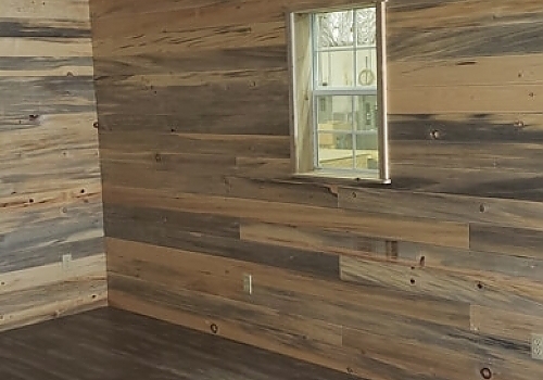  Empty room with a window in tiny house.