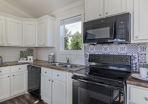 Another view of Plano, Texas tiny house kitchen.