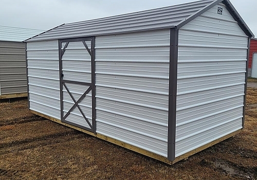 White door with gray trim shed.