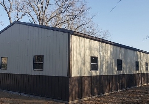 Rear view of cream and dark brown garage.