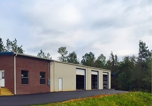 Side view of Capital Steel Auto Shop in Tulsa, OK