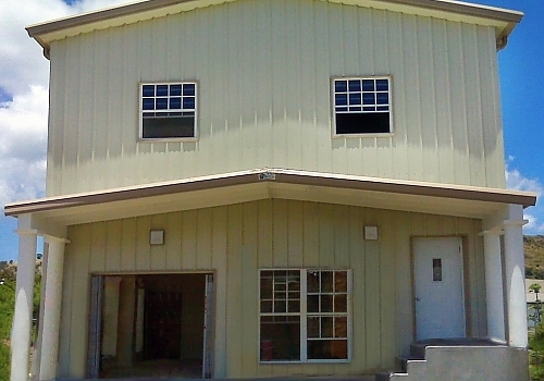 Front view of a Capital Steel Local Metal House in Clarksville, TX