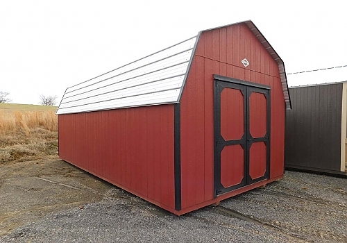 Red & black high wall barn in Tullahassee, OK