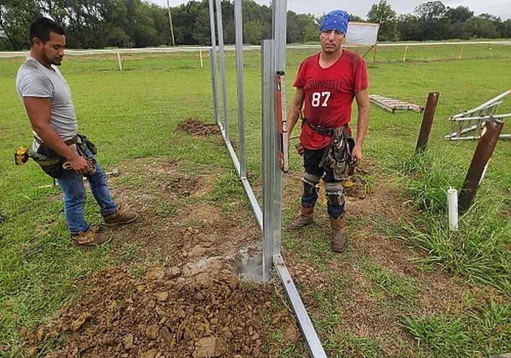 Beginning phase of metal shed installation in Red Bird, OK
