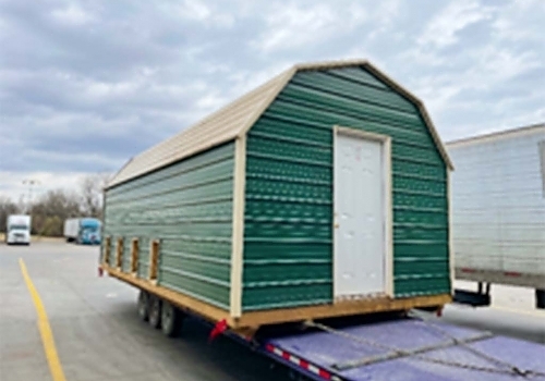 Green metal kennel