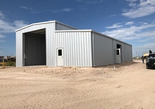 Gray storage shed construction zone in Jacksonville, TX